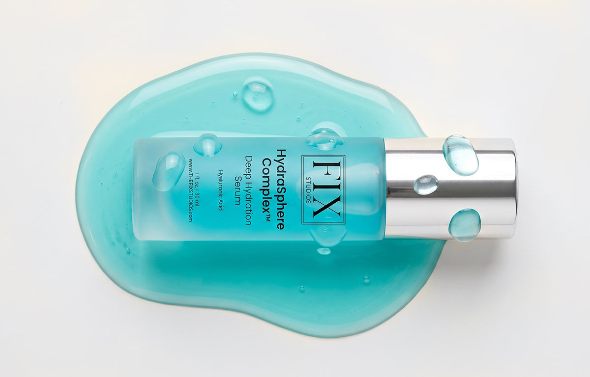 Liquid from Fix Studios HydraSphere Complex Hyaluronic Acid Deep Hydration Serum with its bottle resting on it