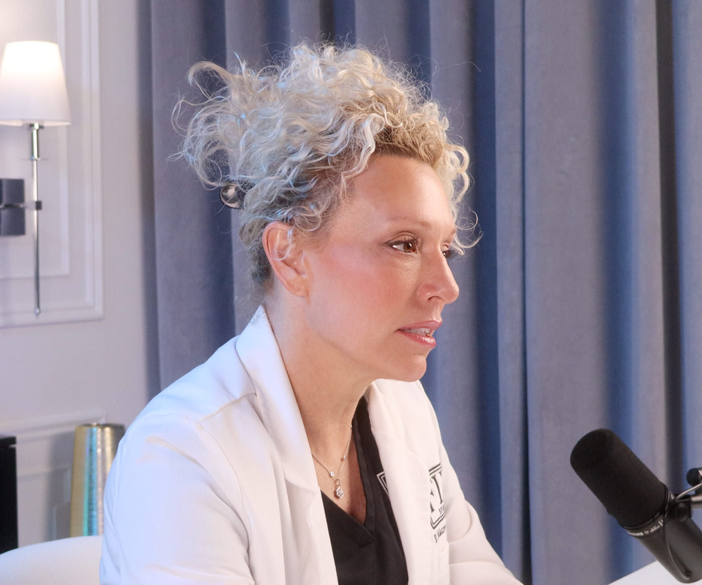 Dr. Beth Matre DNP, CNP podcasting in the Fix Studios Media podcast studio
