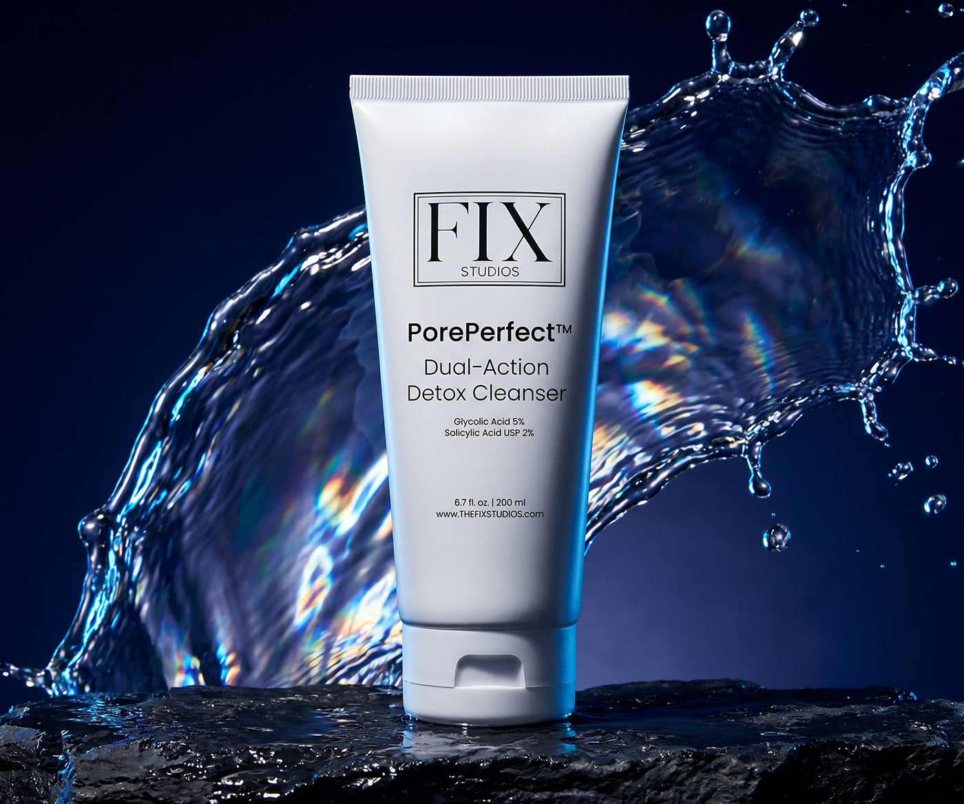 A bottle of Fix Studios medical-grade PorePerfect™ Dual-Action Detox Cleanser with water splashing in the background