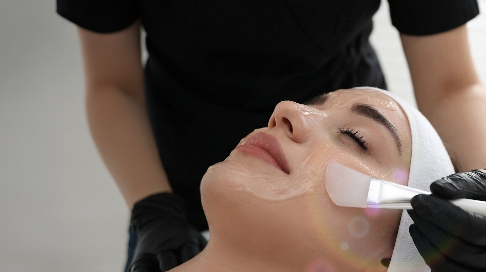 Person receiving a facial treatment Cincinnati Mason at Fix Studios