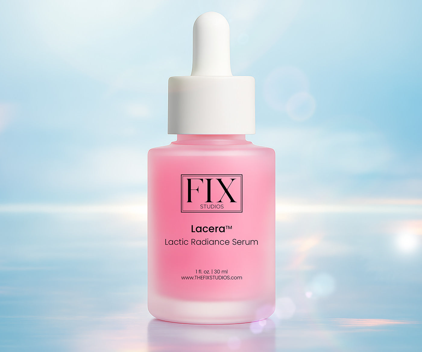 A bottle of Fix Studios medical-grade Lacera™ Lactic Radiance Serum glows as light reflects from a bright blue backdrop